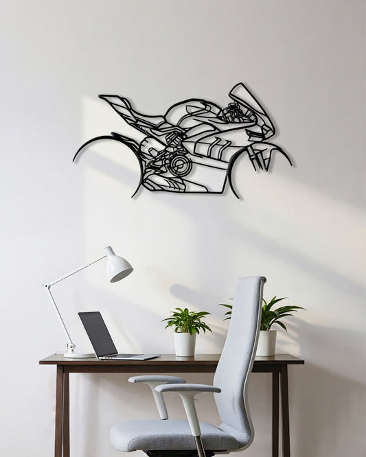 Motorcycle cutout shape made of black metal hanging on the wall