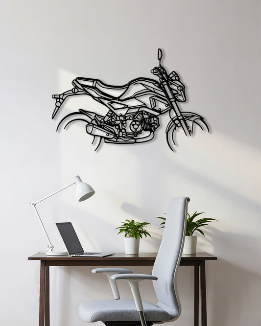 Motorcycle cutout shape made of black metal hanging on the wall