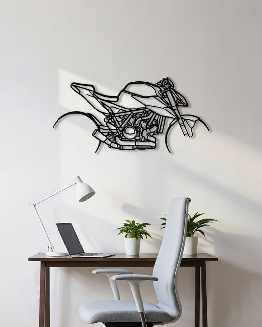 Motorcycle cutout shape made of black metal hanging on the wall
