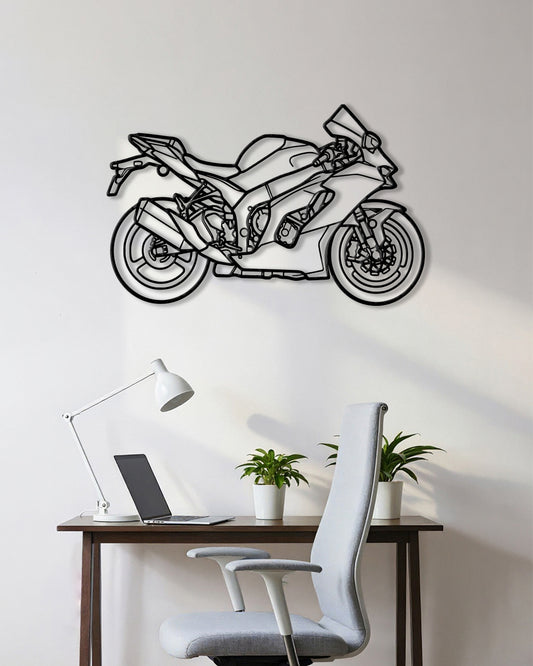 Motorcycle cutout shape made of black metal hanging on the wall