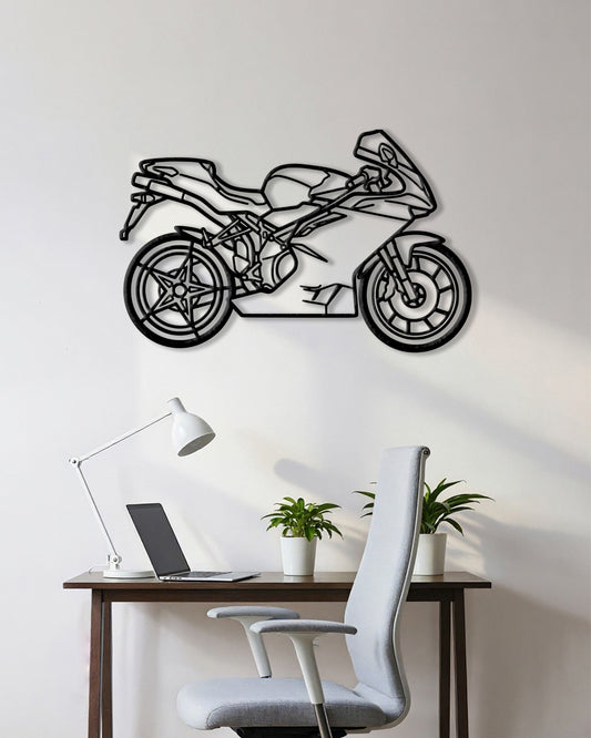 Motorcycle cutout shape made of black metal hanging on the wall