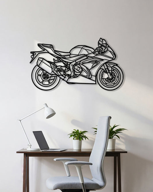 Motorcycle cutout shape made of black metal hanging on the wall