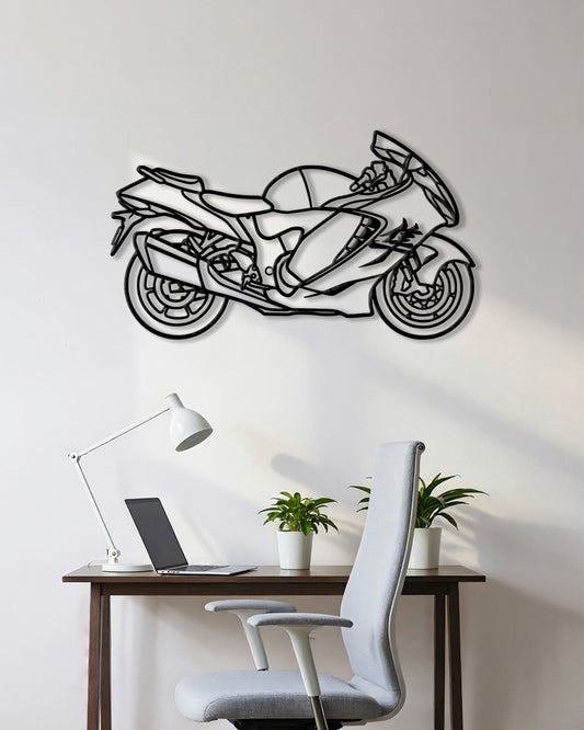 Motorcycle cutout shape made of black metal hanging on the wall