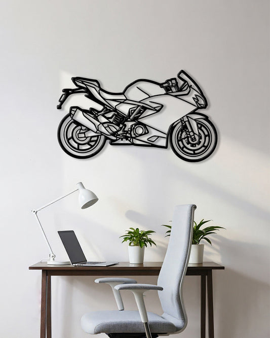 Motorcycle cutout shape made of black metal hanging on the wall