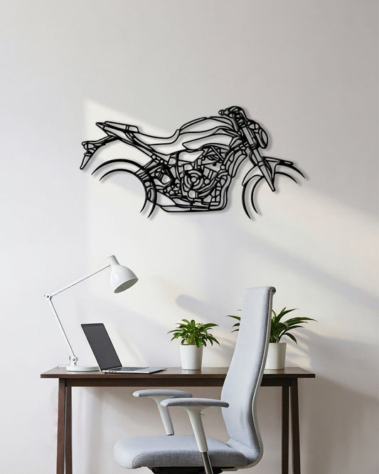 Motorcycle cutout shape made of black metal hanging on the wall